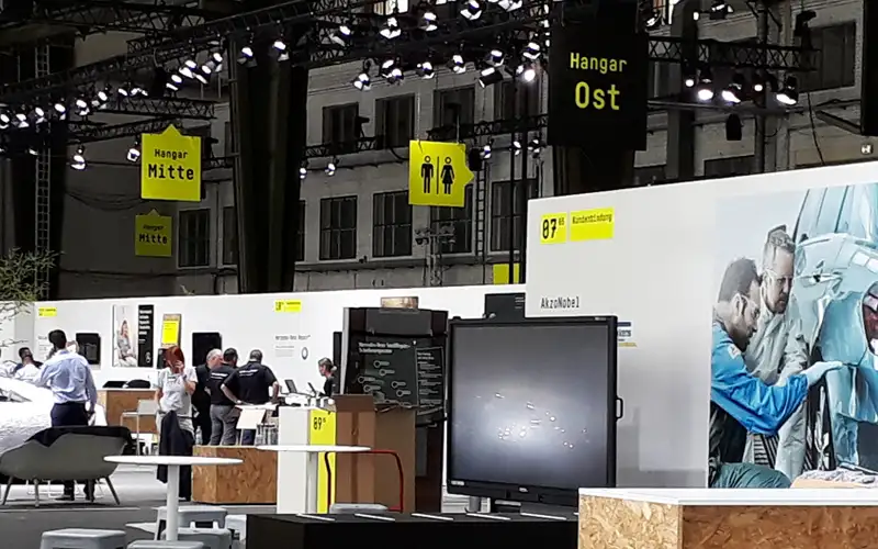 messe event beschriftung folierung deckenschilder leitsystem montage